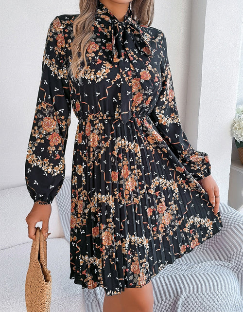 Load image into Gallery viewer, Pleated Printed Tie Neck Long Sleeve Dress
