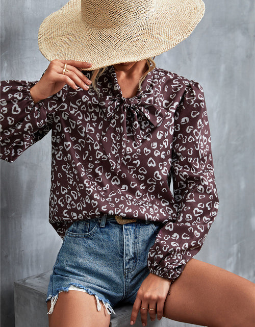 Load image into Gallery viewer, Printed Tie Neck Puff Sleeve Blouse
