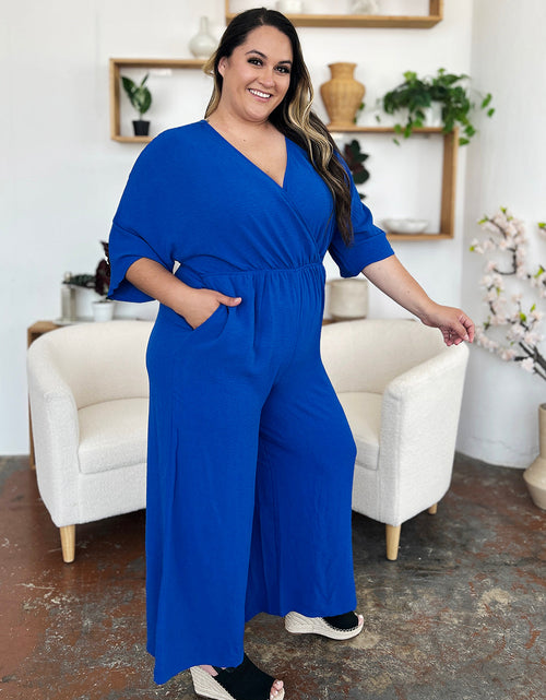 Load image into Gallery viewer, Double Take Full Size Surplice Wide Leg Jumpsuit with Pockets
