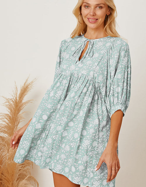Load image into Gallery viewer, Floral Tie Neck Ruched Babydoll Dress
