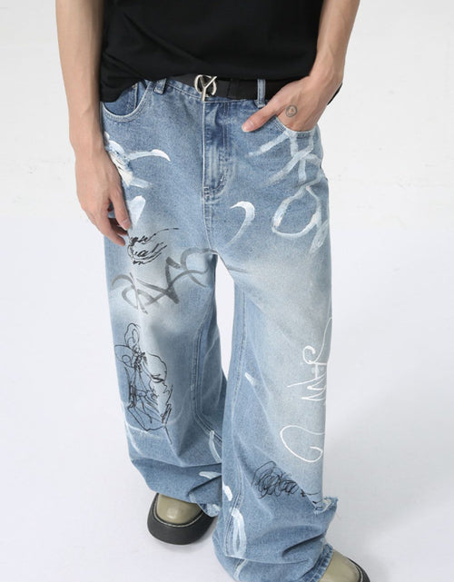 Load image into Gallery viewer, Mid Rise Graffiti Print Distressed Wide Leg Jeans
