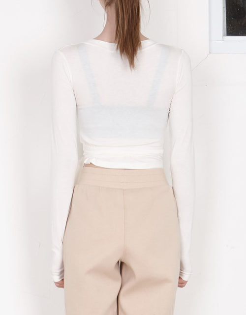 Load image into Gallery viewer, Tied Surplice Long Sleeve Top
