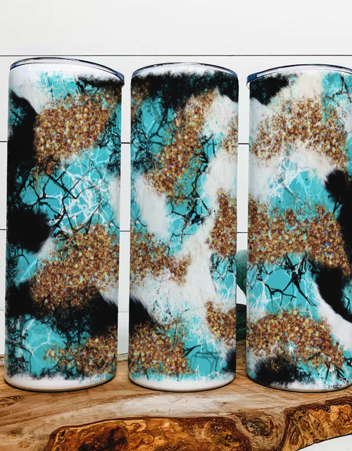 Load image into Gallery viewer, faux cowhide and Turquoise|Skinny Tumbler|Optional Bluetooth Speaker| Speaker Color Varies by Rowdy Ridge Co
