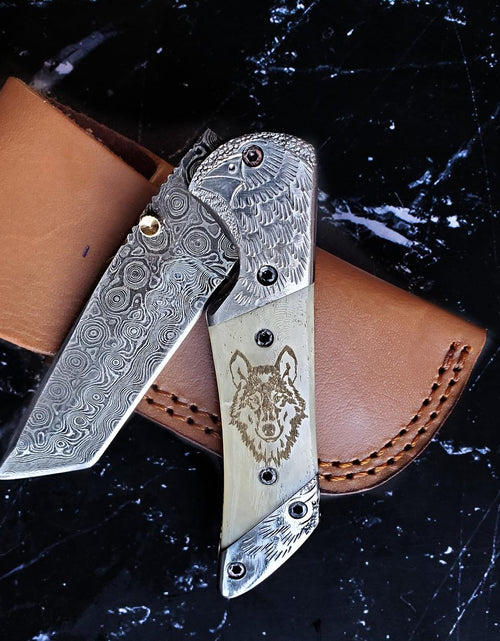 Load image into Gallery viewer, Titan American Eagle - Raindrop Damascus folding blade/ EDC/ Eagle engraved Steel Bolster / Engraved Wolf on Bone by Titan International Knives
