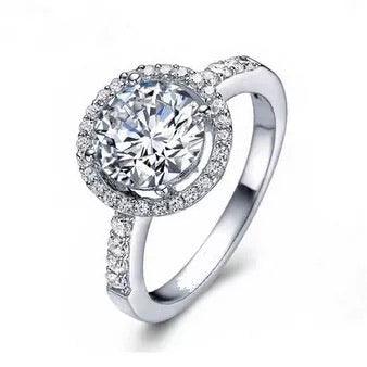 Load image into Gallery viewer, White Gold Halo Round Cut Cubic Zirconia Ring by Hollywood Sensation®

