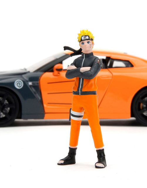 Load image into Gallery viewer, 2009 Nissan GT-R (R35) Orange and Dark Gray with Yellow Top and Graphics and Naruto Diecast Figure "Naruto Shippuden" (2009-2017) TV Series "Anime Hollywood Rides" Series 1/24 Diecast Model Car by Jada
