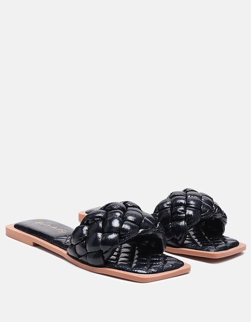 Load image into Gallery viewer, marcue patent pu quilted slides in woven straps by London Rag
