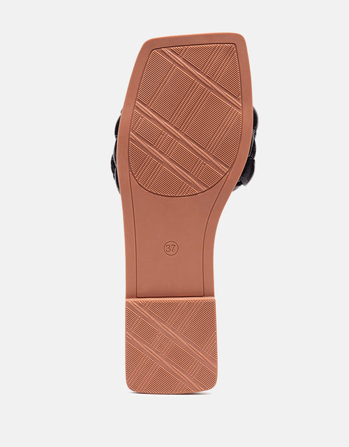 Load image into Gallery viewer, marcue patent pu quilted slides in woven straps by London Rag
