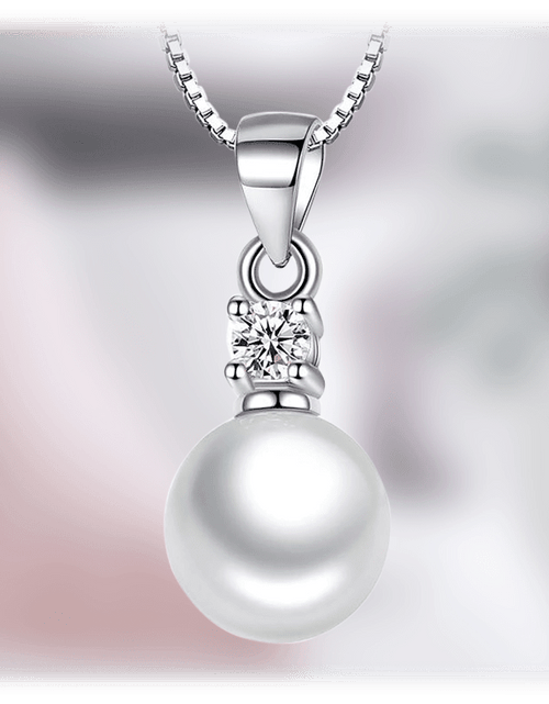 Load image into Gallery viewer, White Gold Pearl Pendant Necklace with Cubic Zirconia Accent Stone Necklace by Hollywood Sensation®
