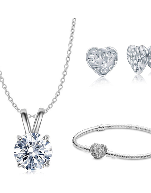 Load image into Gallery viewer, Jewelry Bundle: Crystal Pendant Necklace, Micro Pave Heart Charm Bracelet, Hammered Heart Stud Earrings by Donatello Gian
