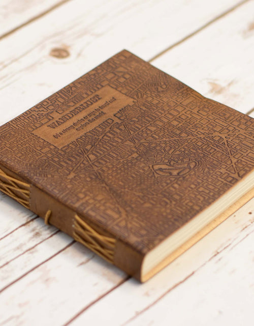 Load image into Gallery viewer, Wanderlust 7x7 Artist Handmade Leather Journal by Soothi
