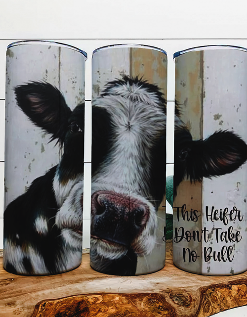 Load image into Gallery viewer, This Heifer Dont Take No Bull - 20 oz Steel Skinny Tumbler - Optional Blue Tooth Speaker - Speaker Color will Vary by Rowdy Ridge Co

