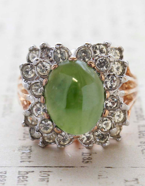 Load image into Gallery viewer, Vintage Emerald Green Crystal Cabochon Stone &amp; Clear Crystal Ring in 18kt Yellow Gold Electroplate by PVD Vintage Jewelry

