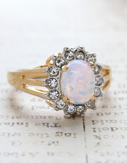 Load image into Gallery viewer, Vintage Jewelry Genuine Stone or Crystal Surrounded by Clear Austrian Crystals Ring Made in the USA by PVD Vintage Jewelry
