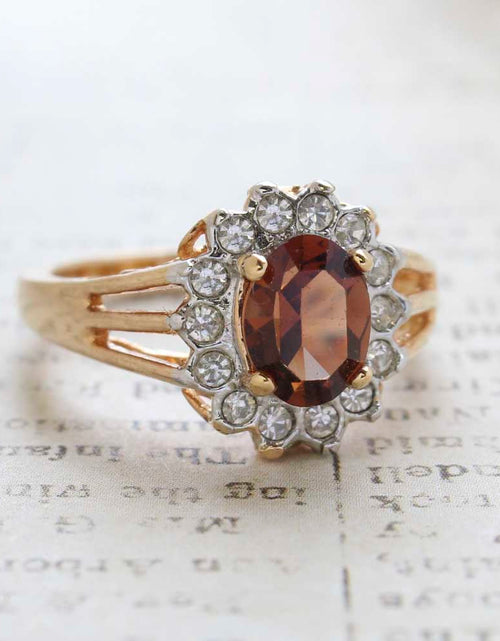Load image into Gallery viewer, Vintage Jewelry Genuine Stone or Crystal Surrounded by Clear Austrian Crystals Ring Made in the USA by PVD Vintage Jewelry
